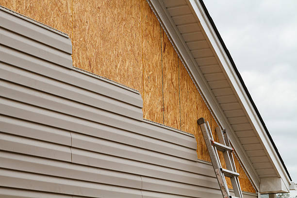 Professional Vinyl Siding technician working in Ardara, PA